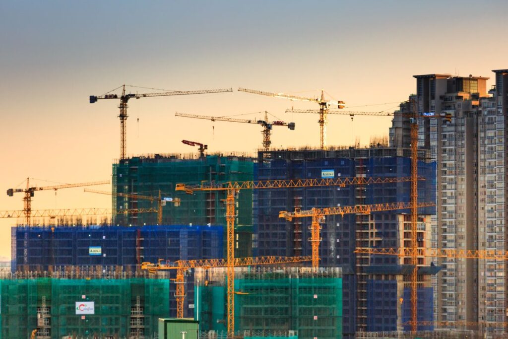 High-rise construction site progress at dusk